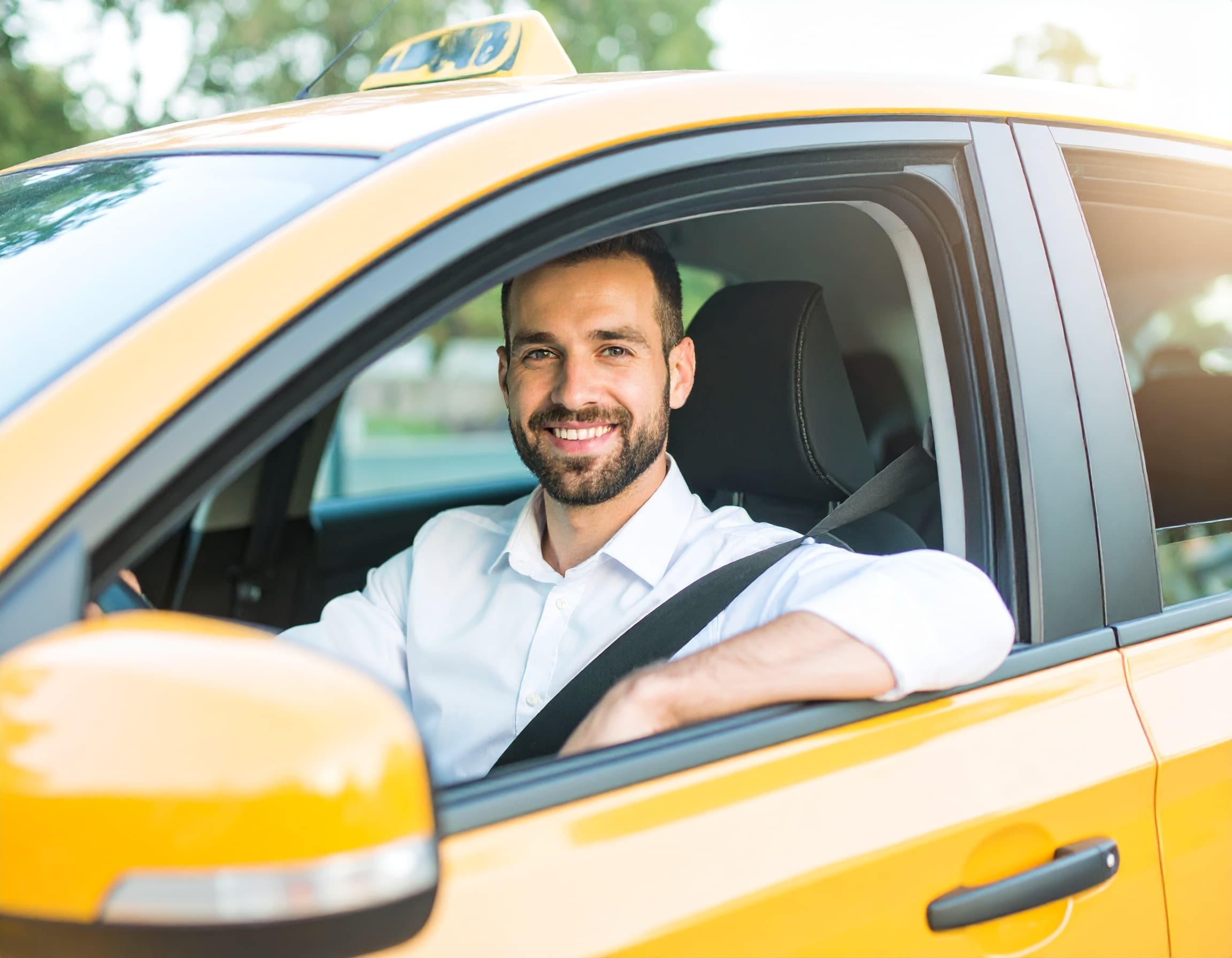 Caregiver helping elderly person into a vehicle for transportation service